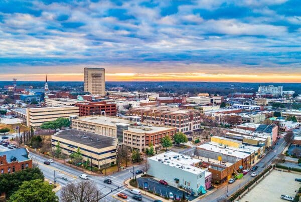 Spartanburg, SC - Aerial View of Downtown Spartanburg South Carolina with a Colorful Sunset Sky